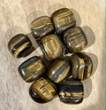 Tiger Eye Tumbles